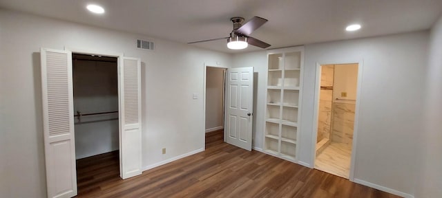 unfurnished bedroom featuring a closet, wood finished floors, baseboards, visible vents, and recessed lighting