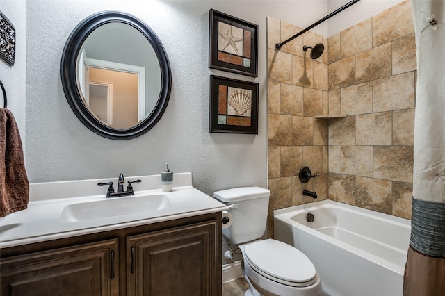 1001 Hodge St, Mckinney, TX 75071 - full bathroom featuring a textured wall, toilet, shower / bathtub combination with curtain, and vanity