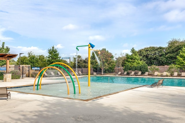 1001 Hodge St, Mckinney, TX 75071 - community pool with a water play area, fence, and a patio