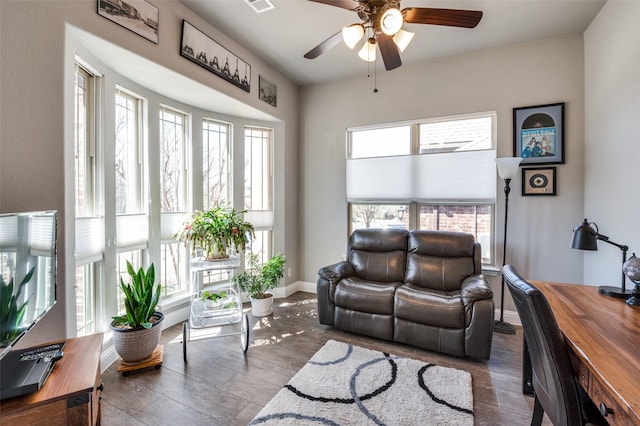 1001 Hodge St, Mckinney, TX 75071 - living area featuring a ceiling fan, wood finished floors, a desk, and baseboards