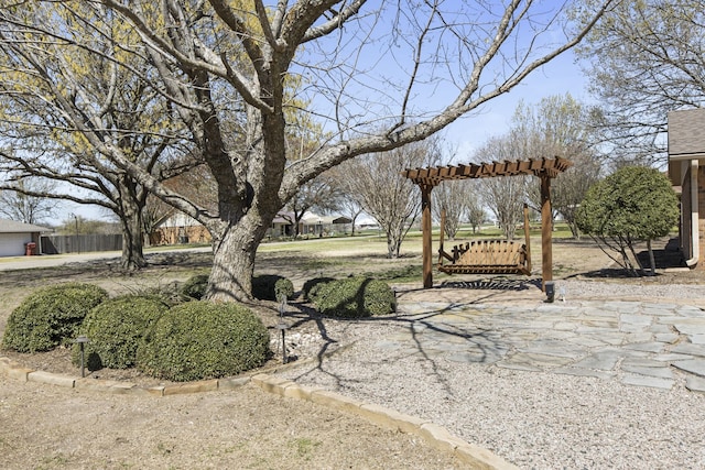 view of property's community with a pergola