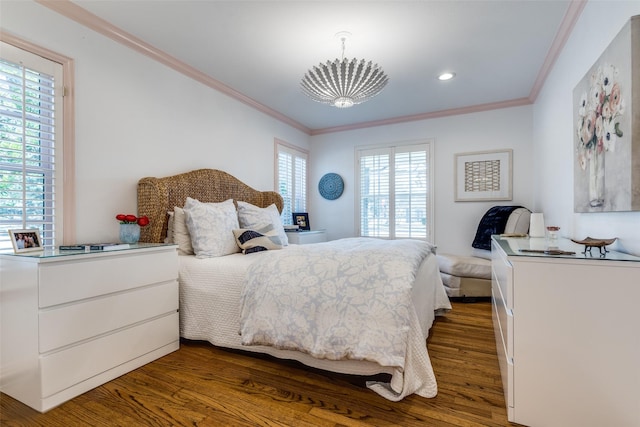 bedroom with recessed lighting, dark wood-type flooring, and ornamental molding