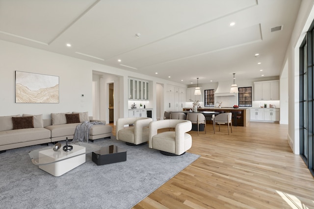 9518 Still Creek Ln, Dallas, TX 75238 - living room featuring light wood finished floors and recessed lighting