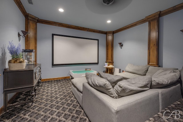 carpeted home theater room featuring recessed lighting, ornate columns, baseboards, and ornamental molding
