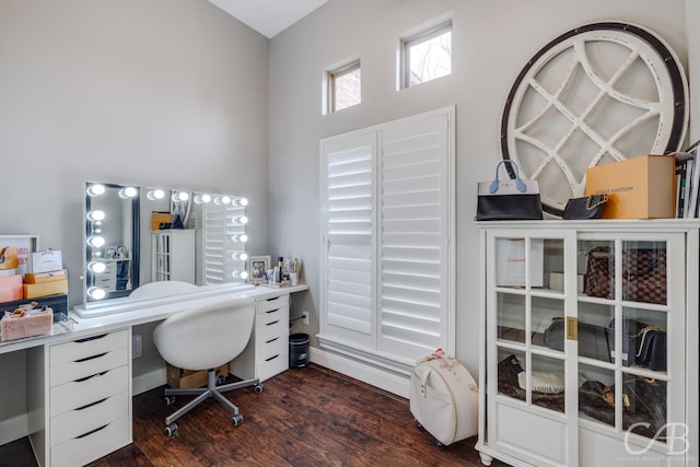 home office featuring dark wood-type flooring and baseboards
