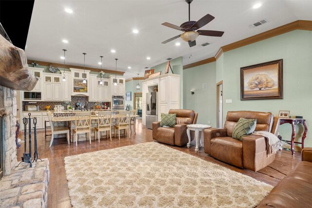 10790 White Settlement Rd, Fort Worth, TX 76108 - living area with a ceiling fan, crown molding, wood finished floors, and recessed lighting