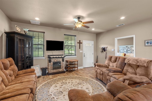10790 White Settlement Rd, Fort Worth, TX 76108 - living room featuring light wood finished floors, a ceiling fan, a fireplace, recessed lighting, and baseboards