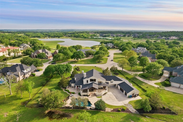 8608 Doral Ct W, Flower Mound, TX 75022 - drone / aerial view with a residential view and a water view