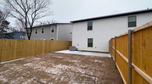 2616 S Fannin Ave, Denison, TX 75020 - rear view of property featuring a patio, cooling unit, and a fenced backyard