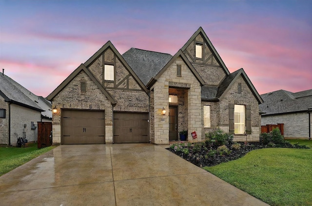 2193 Cloverfern Way, Haslet, TX 76052 - view of front of home with stone siding, driveway, a garage, and a yard
