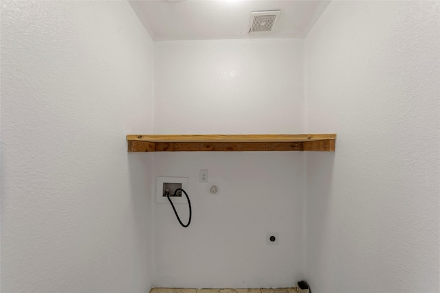 washroom with visible vents, electric dryer hookup, laundry area, and washer hookup
