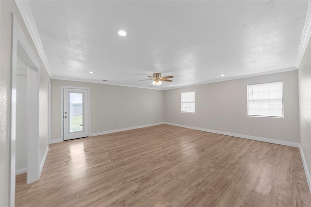 empty room with light wood-style flooring, baseboards, ornamental molding, recessed lighting, and a ceiling fan