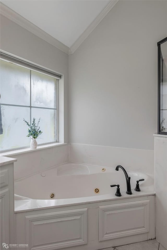 521 Lovers Lndg, Bossier City, LA 71111 - bathroom with a tub with jets, ornamental molding, and lofted ceiling