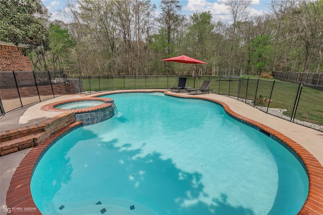 521 Lovers Lndg, Bossier City, LA 71111 - view of pool featuring a pool with connected hot tub, a patio area, a trampoline, fence, and a lawn