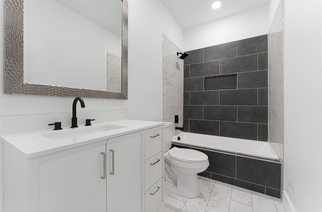 318 Whitworth St, Sulphur Springs, TX 75482 - full bath with tiled shower / bath combo, marble finish floor, toilet, recessed lighting, and vanity