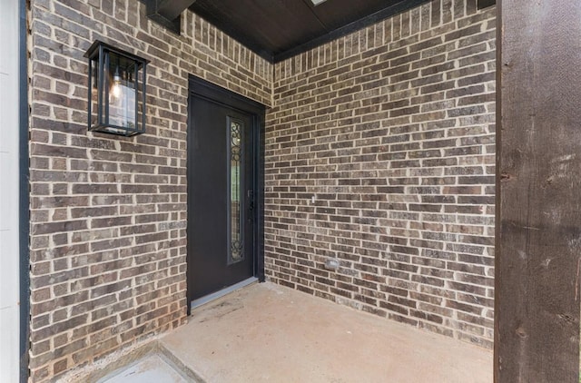 318 Whitworth St, Sulphur Springs, TX 75482 - view of exterior entry with brick siding