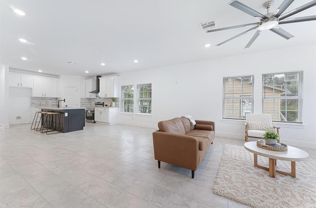 318 Whitworth St, Sulphur Springs, TX 75482 - living area with baseboards, visible vents, recessed lighting, and a ceiling fan