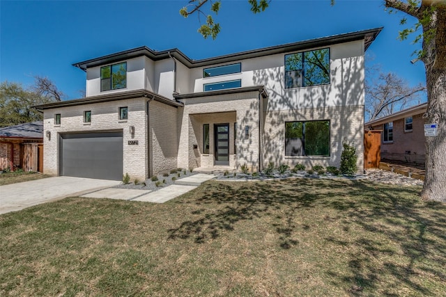 view of front of property featuring driveway, an attached garage, brick siding, a front lawn, and stucco siding