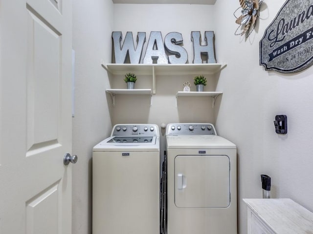 7913 Wildwest Dr, Fort Worth, TX 76131 - laundry room with washing machine and dryer
