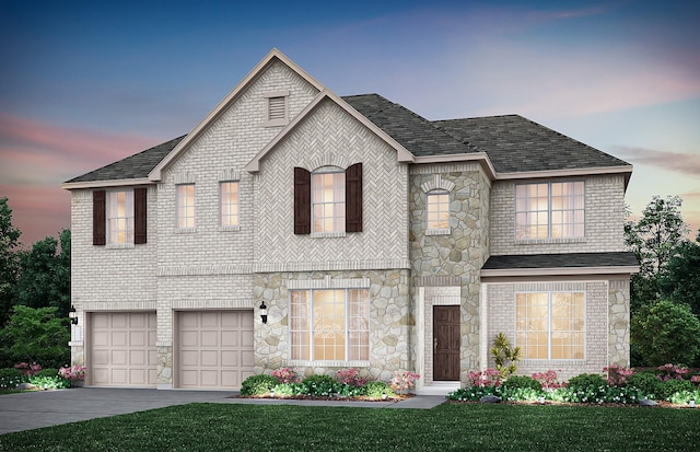 2621 Landmark Dr, Celina, TX 75009 - view of front facade featuring driveway, stone siding, roof with shingles, brick siding, and a garage