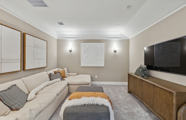 2621 Landmark Dr, Celina, TX 75009 - living room featuring a tray ceiling, light colored carpet, visible vents, and baseboards