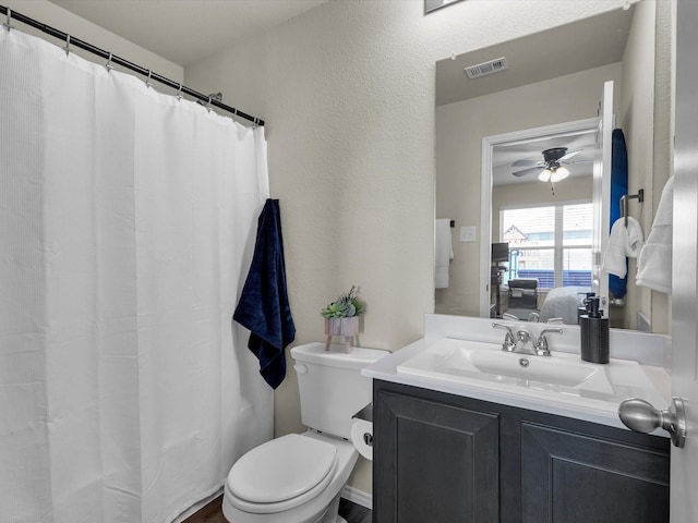 6348 Sloop St, Fort Worth, TX 76179 - full bathroom featuring vanity, toilet, connected bathroom, visible vents, and a ceiling fan