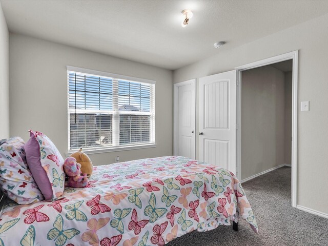 6348 Sloop St, Fort Worth, TX 76179 - bedroom featuring baseboards and carpet flooring