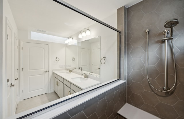 244 Kistler Dr, Little Elm, TX 76227 - full bathroom with tiled shower and double vanity