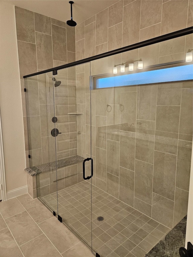 full bathroom featuring a shower stall