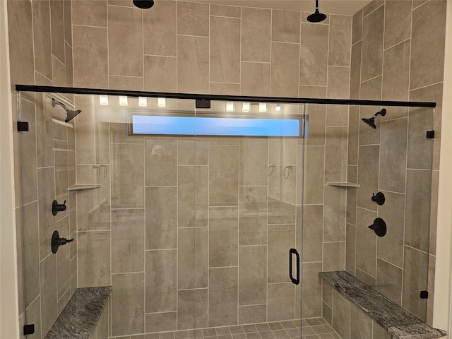 bathroom with a shower stall