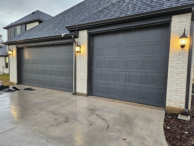 garage featuring driveway