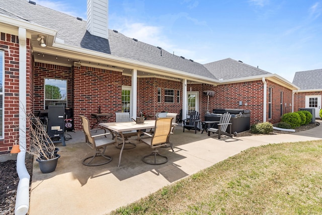 view of patio / terrace featuring grilling area and outdoor dining area