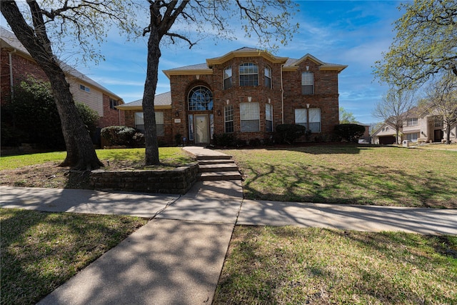 1808 Paddington Ct, Arlington, TX 76017 - traditional home with brick siding and a front lawn
