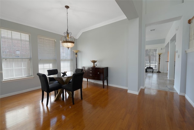 1808 Paddington Ct, Arlington, TX 76017 - dining room with baseboards, crown molding, and wood finished floors