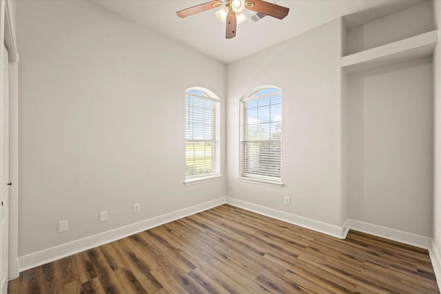 153 Whispering Winds Dr, Gunter, TX 75058 - unfurnished room featuring a ceiling fan, wood finished floors, and baseboards