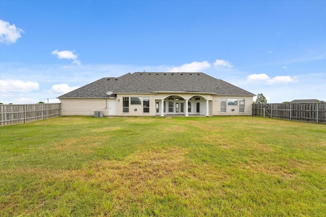 153 Whispering Winds Dr, Gunter, TX 75058 - rear view of house with central AC unit and a shingled roof