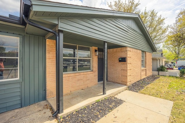 2112 Pontiac Dr, Carrollton, TX 75006 - doorway to property with brick siding