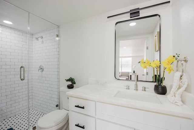 2112 Pontiac Dr, Carrollton, TX 75006 - bathroom with a stall shower, recessed lighting, toilet, and vanity
