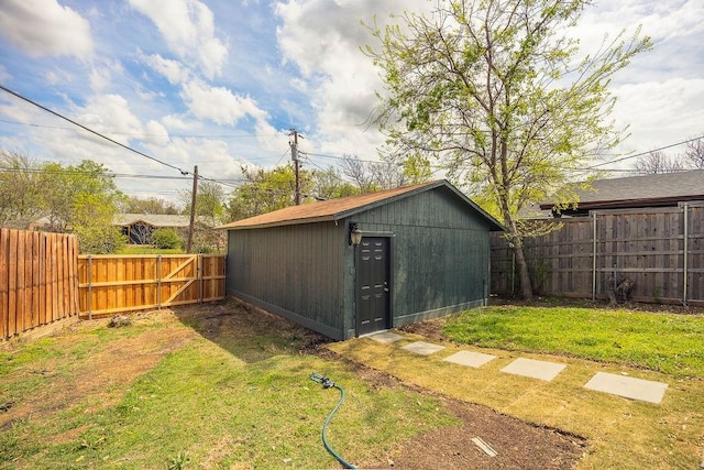 2112 Pontiac Dr, Carrollton, TX 75006 - view of outdoor structure with an outbuilding and a fenced backyard