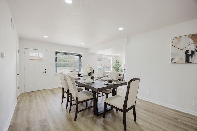 2112 Pontiac Dr, Carrollton, TX 75006 - dining area featuring baseboards, light wood-style flooring, and recessed lighting