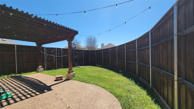 view of yard featuring a fenced backyard and a patio area