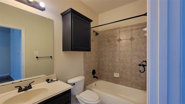 full bath featuring toilet, vanity, and bathing tub / shower combination