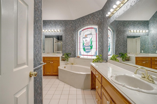 1002 Loch Lomond Dr, Arlington, TX 76012 - full bathroom featuring wallpapered walls, tile patterned flooring, a sink, and a garden tub