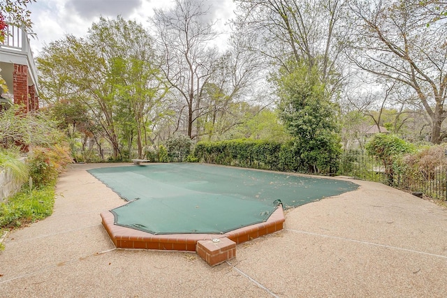 1002 Loch Lomond Dr, Arlington, TX 76012 - view of swimming pool with a diving board, fence, and a patio