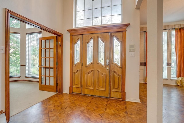 1002 Loch Lomond Dr, Arlington, TX 76012 - entrance foyer with a high ceiling and baseboards