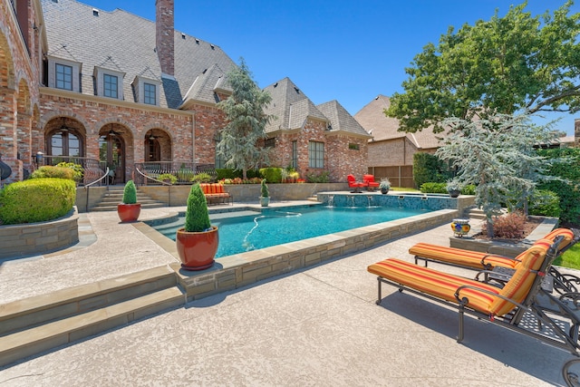 view of swimming pool featuring a fenced in pool and a patio area