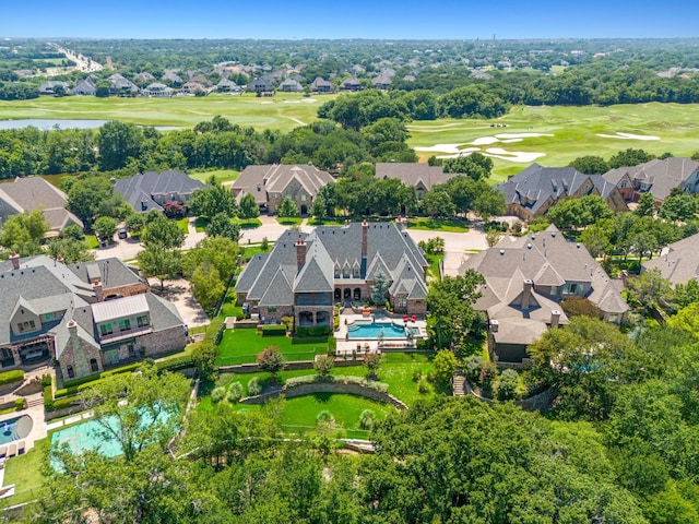 bird's eye view with a residential view and view of golf course