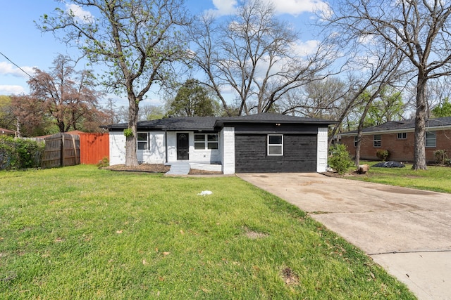 2225 Mack Ln, Dallas, TX 75227 - view of front facade featuring brick siding and driveway