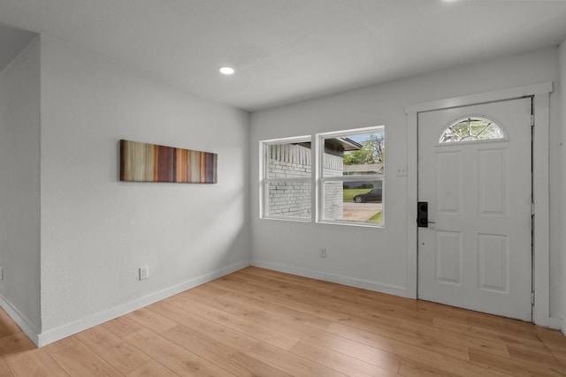 2225 Mack Ln, Dallas, TX 75227 - entrance foyer featuring light wood finished floors, baseboards, and recessed lighting
