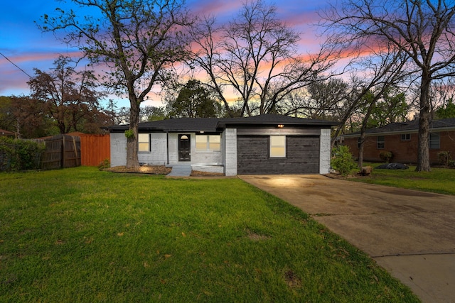 2225 Mack Ln, Dallas, TX 75227 - view of front facade featuring brick siding and driveway